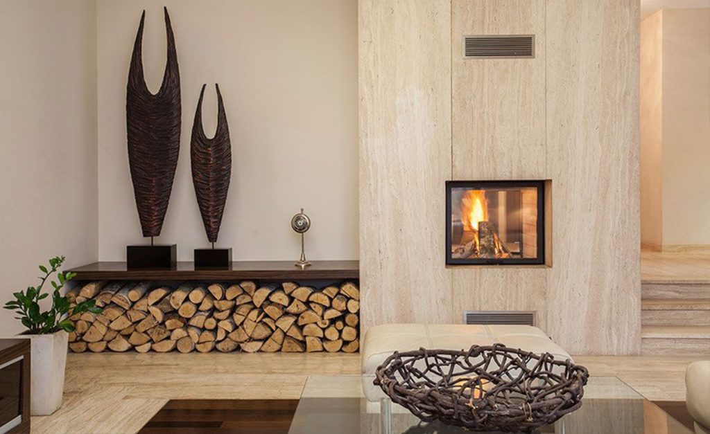 Beautiful fireplace has decorated with vein cut travertine tilles. Atlas Tile & Stone, supplier of travertine tiles in Moorabbin