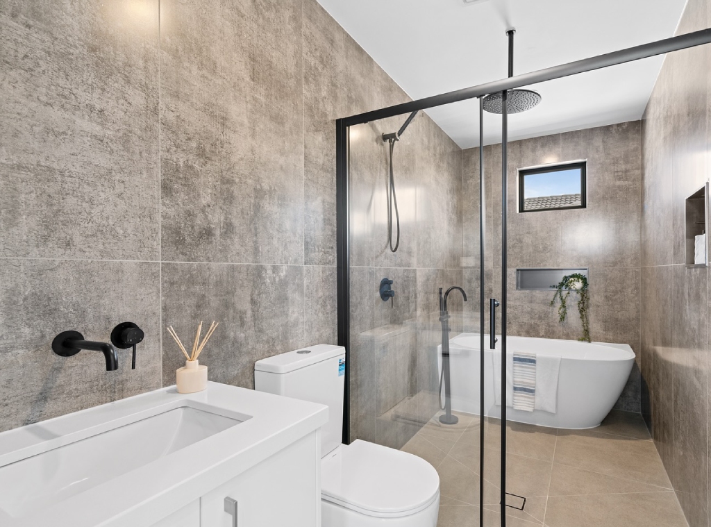 a modern luxury bathroom with large format porcelain tile satin finish light grey-Atlas tile & Stone